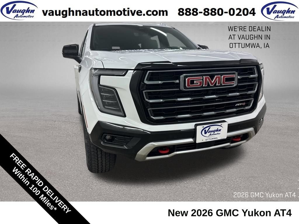 2026 GMC Yukon AT4 in Summit White — front three-quarter view