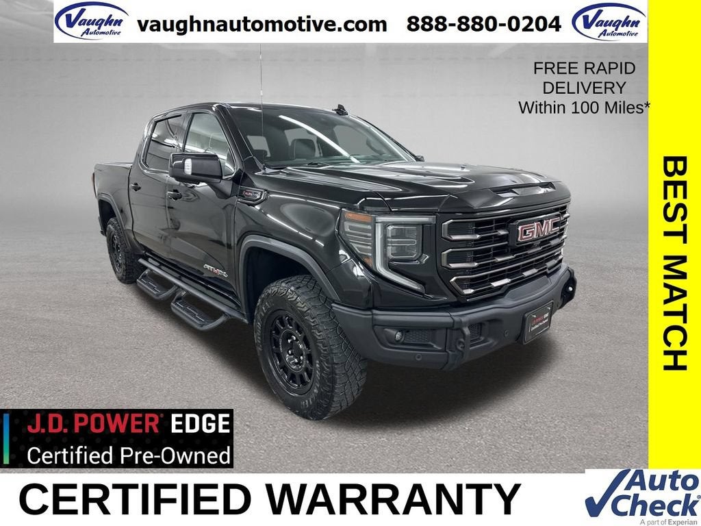 2023 GMC Sierra 1500 AT4X in Onyx Black — front three-quarter view